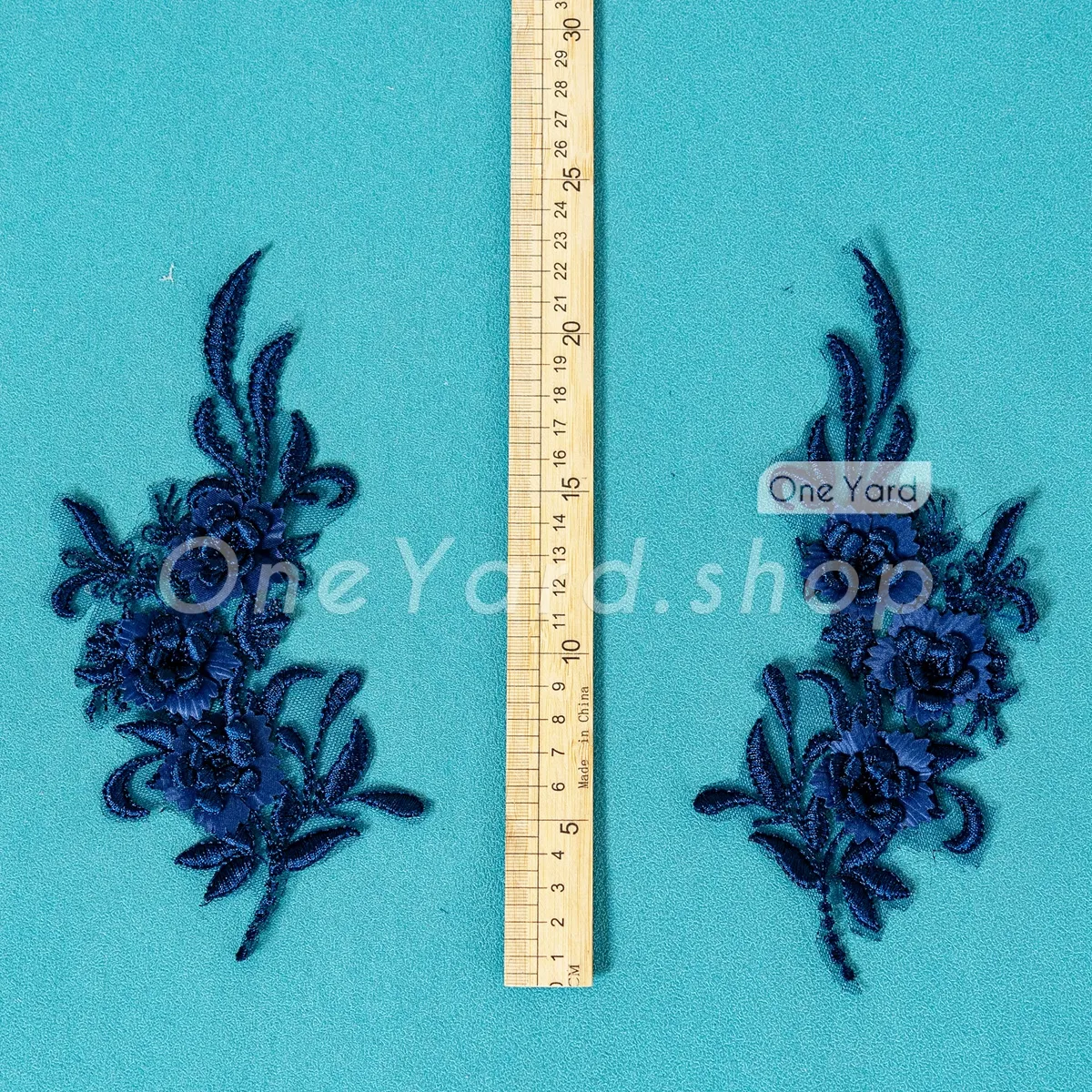 deep rich navy 3D floral lace motifs