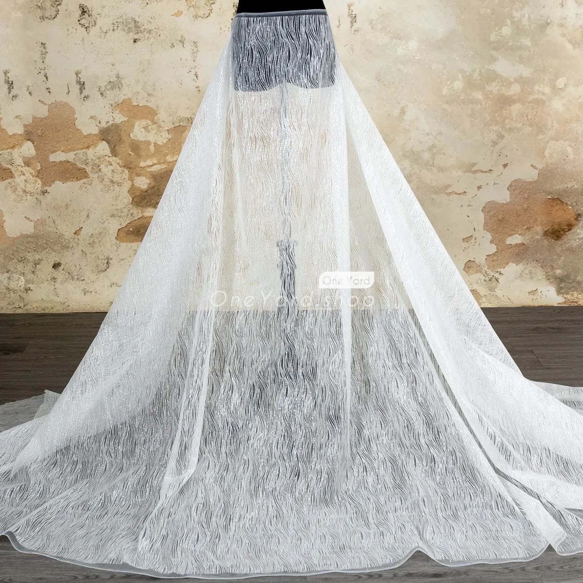 shimmering glitter glued crisp white mesh fabric