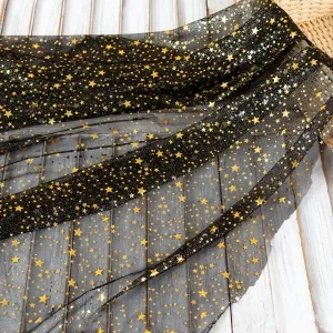 shimmering gold star black mesh lightweight airy fabric