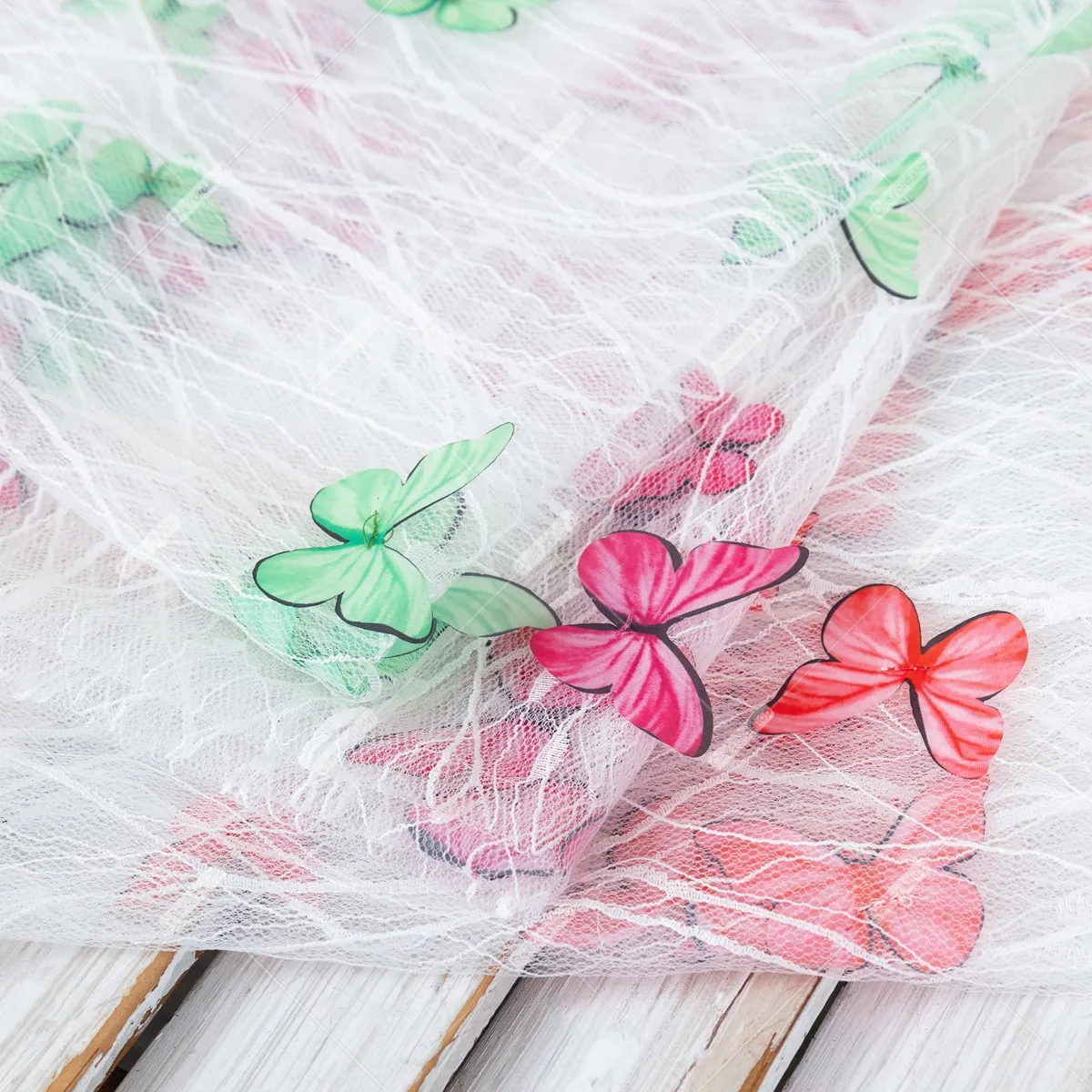 sheer gossamer mesh with vivid 3D butterfly embellishments