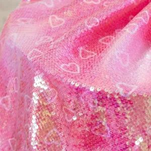 heart pattern printed iridescent hot pink sequin fabric