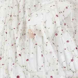 small red flowers green stems ivory mesh embroidery fabric