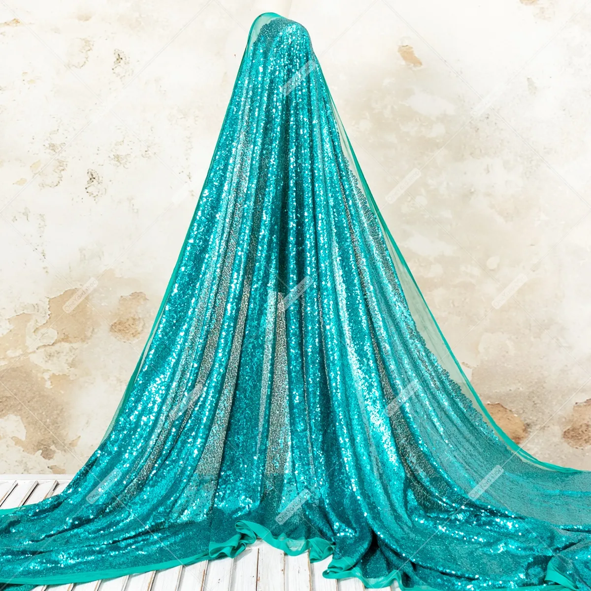 vibrant turquoise small sequin fabric for stage costumes