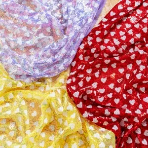 lovely white heart patterned sequin fabric