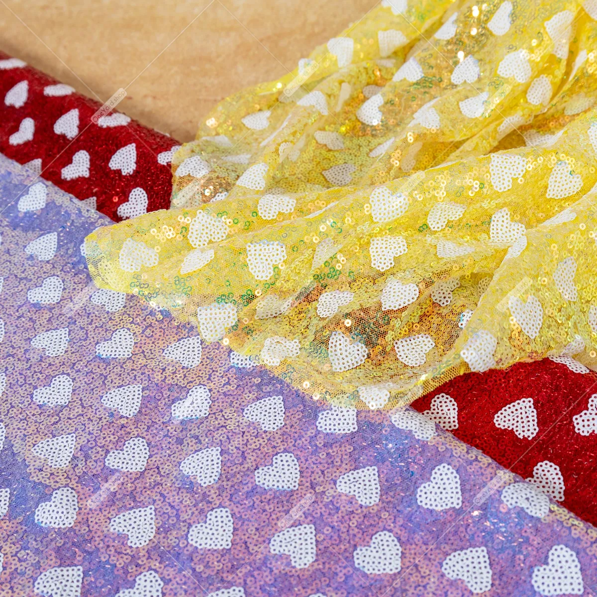 white heart patterned sequin fabric