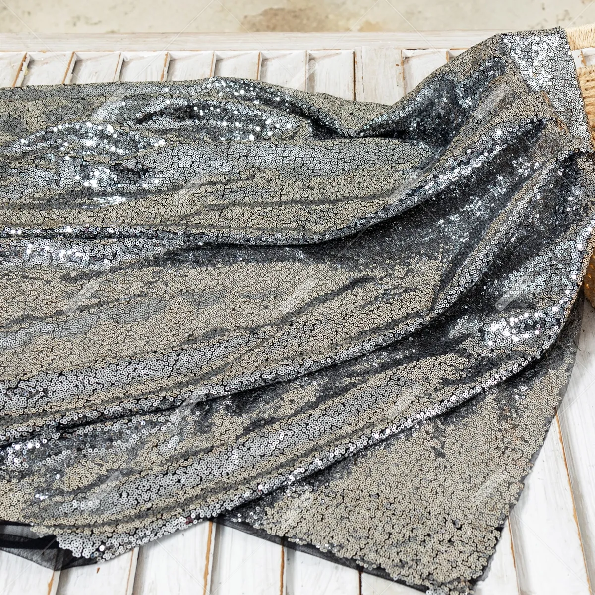 contrast sparkling silver sequins and black mesh fabric contrast sparkling silver sequins and black mesh fabric