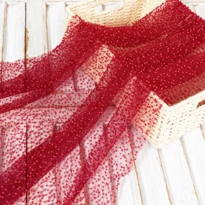 vibrant garnet pearl beading sheer mesh material