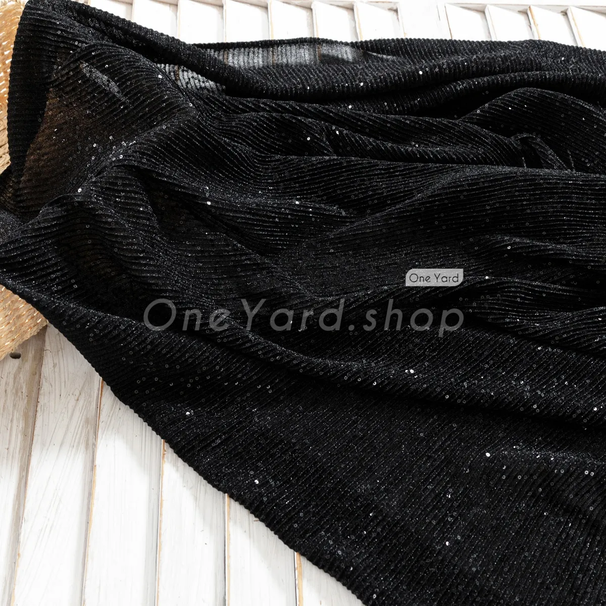 black knit fabric with ribbed texture and sequins black knit fabric with ribbed texture and sequins