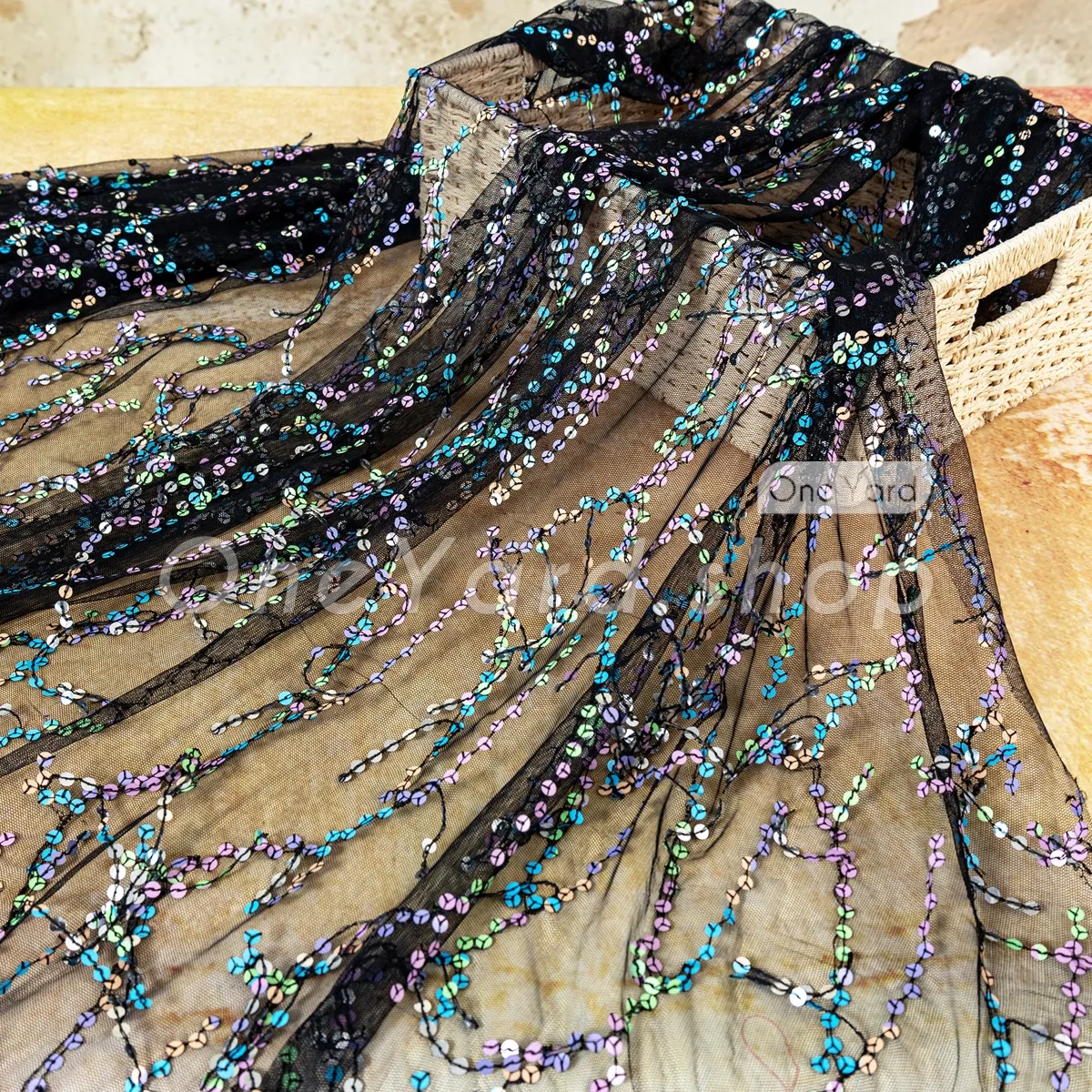 glamorous colorful fringed sequin on black mesh fabric glamorous colorful fringed sequin on black mesh fabric