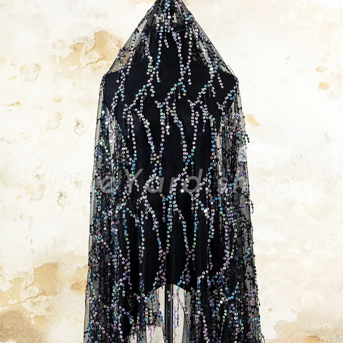 pink blue and green fringed sequin with lightweight black mesh fabric pink blue and green fringed sequin with lightweight black mesh fabric