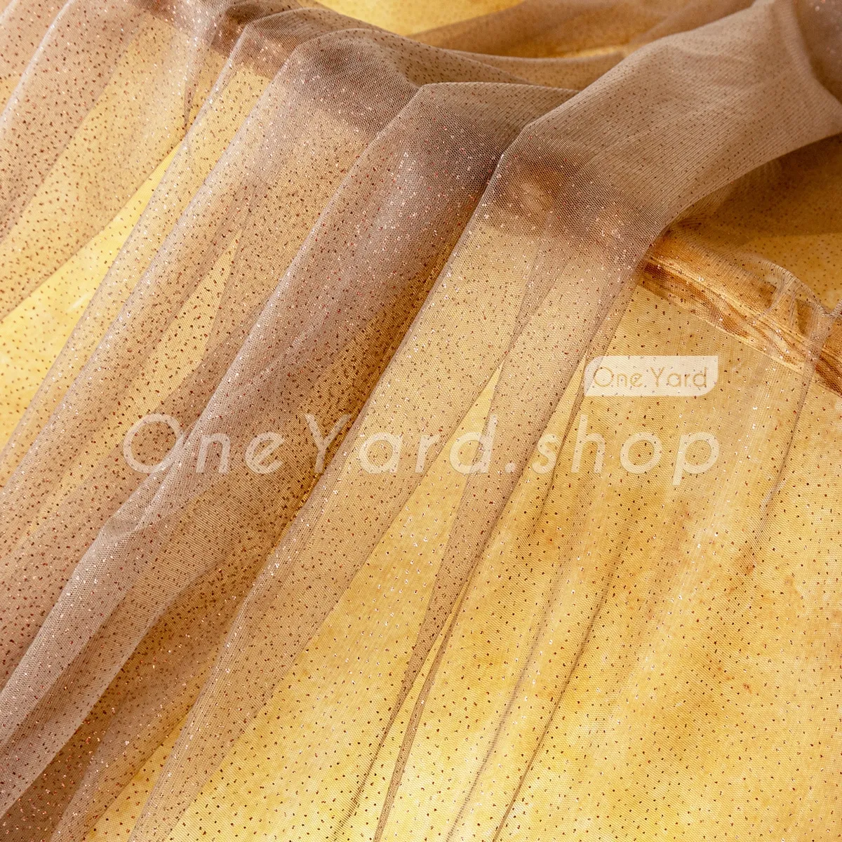 soft coffee tulle sprinkled with fine metallic dots soft coffee tulle sprinkled with fine metallic dots