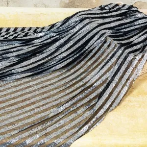 sparkling silver stripe sequin on black mesh fabric