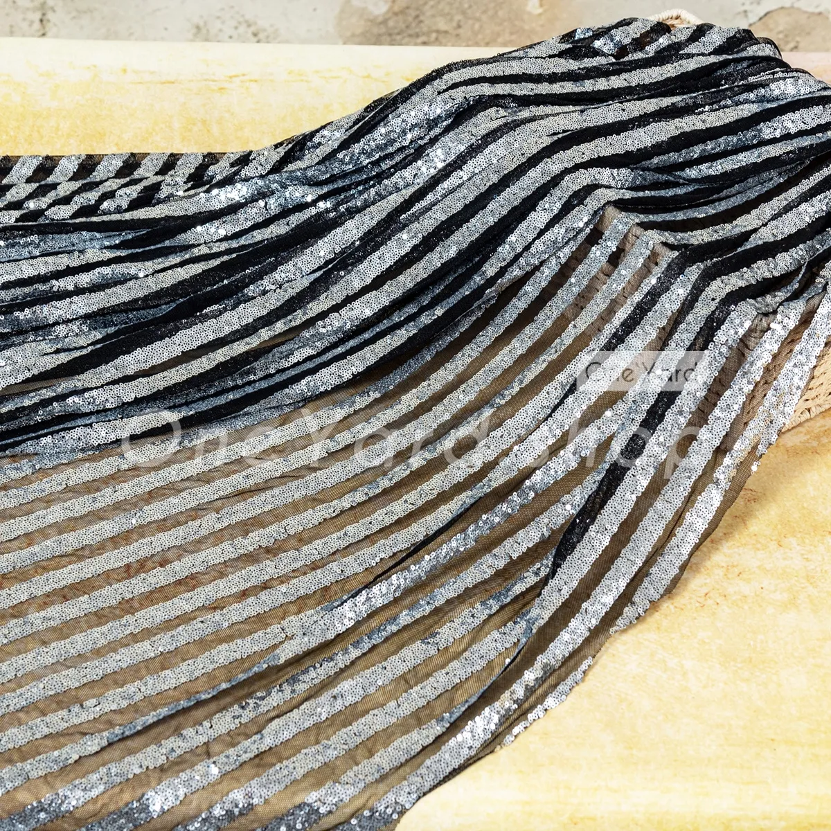 sparkling silver stripe sequin on black mesh fabric sparkling silver stripe sequin on black mesh fabric