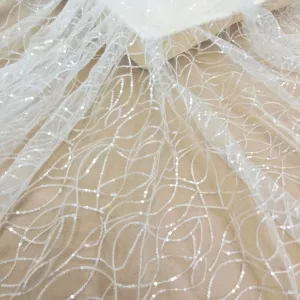 curving wave pattern clear sequins white mesh fabric