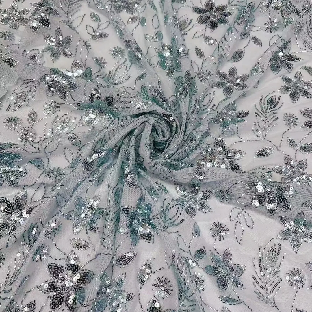 blooming flower and trailing leafy vine sequin mesh fabric blooming flower and trailing leafy vine sequin mesh fabric