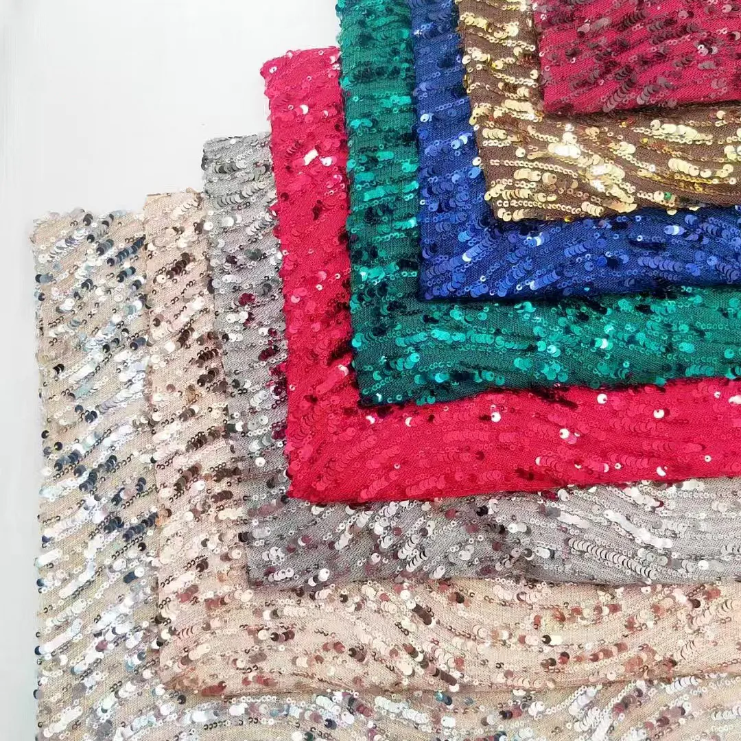 dynamic swirling wave ripple glitz sequined mesh fabric dynamic swirling wave ripple glitz sequined mesh fabric