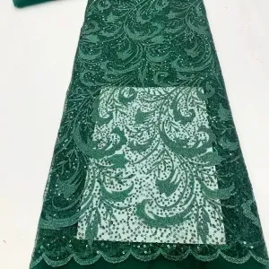 sequinned embroidery with ornate leaf inspired motif