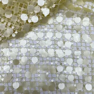 large round paillette embellished open grid mesh fabric