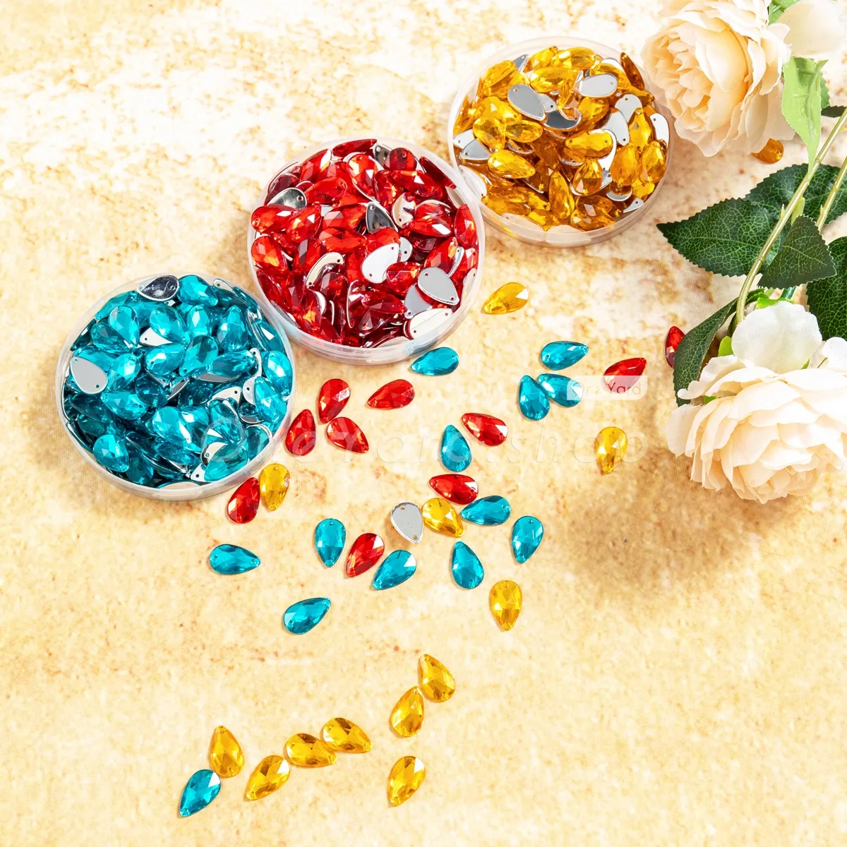 red or ocean or amber teardrop shaped sparkly acrylic crystals red or ocean or amber teardrop shaped sparkly acrylic crystals