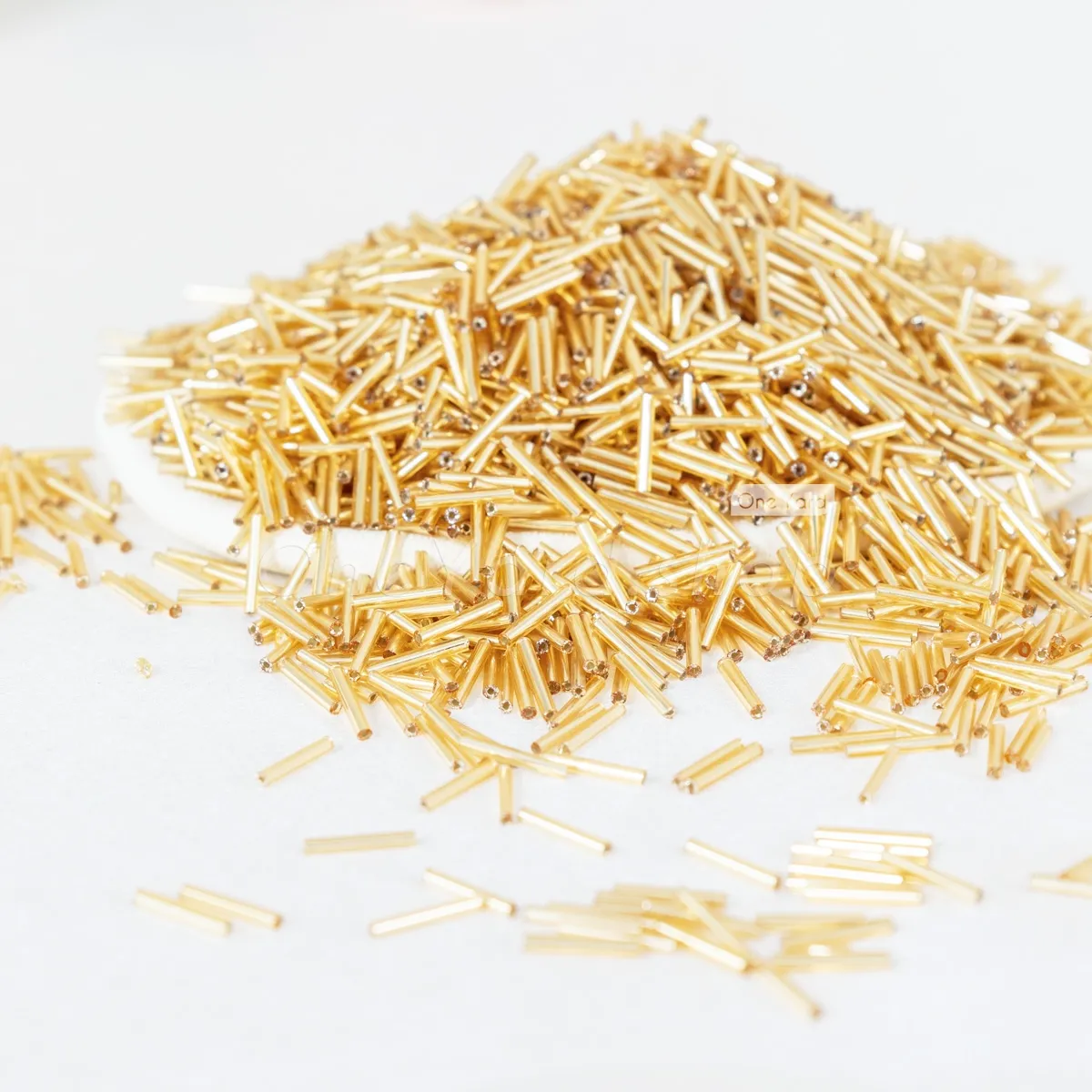 bright metallic gold 12mm long bugle beads bright metallic gold 12mm long bugle beads