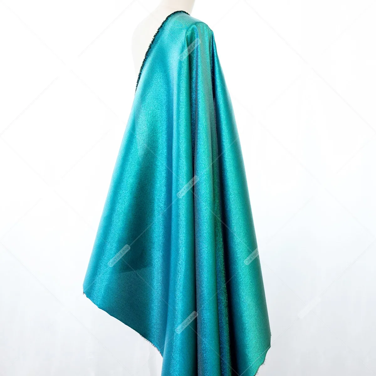 dramatic iridescent green aqua metallic lurex fabric
