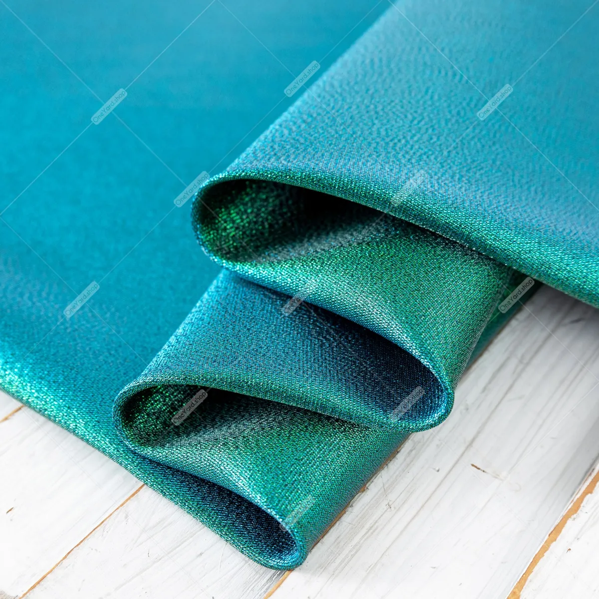 shiny iridescent green and aqua lurex fabric