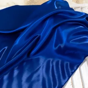 shimmering deep blue smooth satin fabric