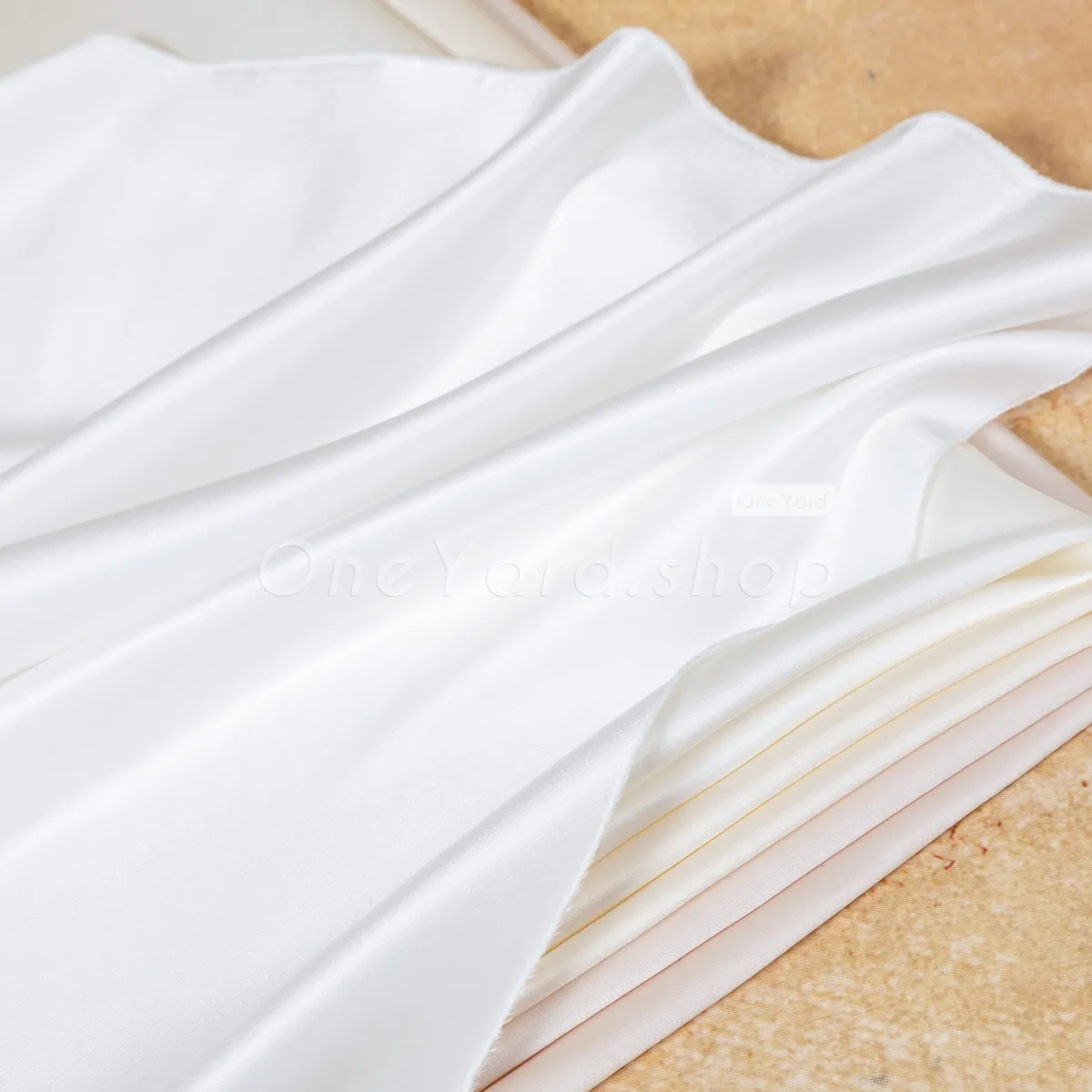 fluid and graceful hand bridal satin fabric