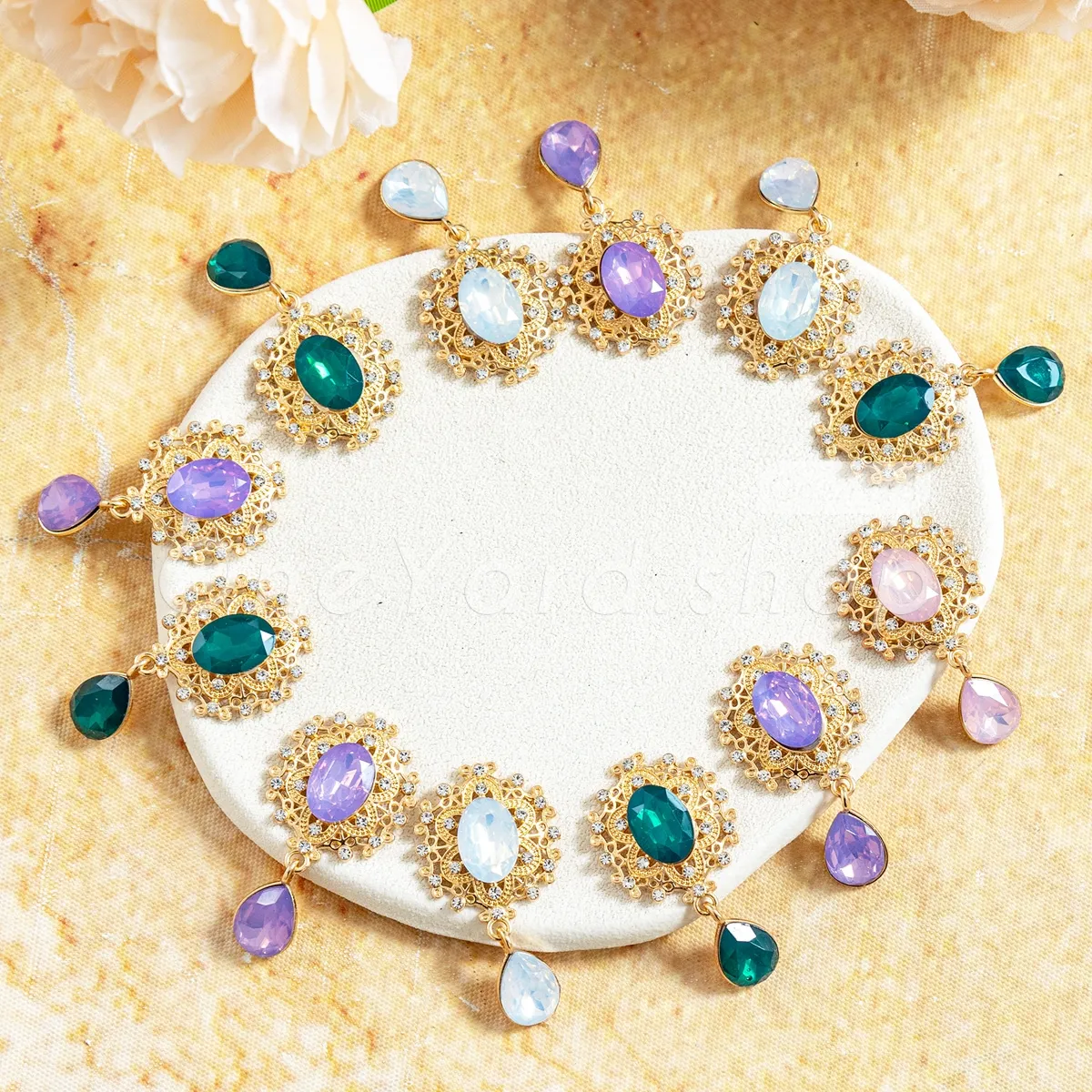 gold filigree rhinestone embellishment with teardrop dangle gold filigree rhinestone embellishment with teardrop dangle